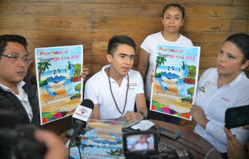 Anuncio de evento para la protección del cangrejo azul.
