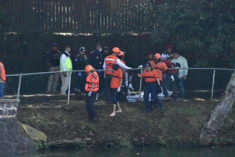Personal de Escuadrón Nacional de Rescate y de Fiscalía realizaron las labores de rescate.