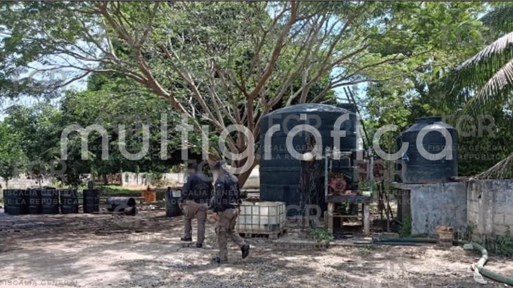 Ejecuta FGR orden de cateo y asegura más de 50 mil litros de hidrocarburo, armas y vehículos en Tihuatlán
